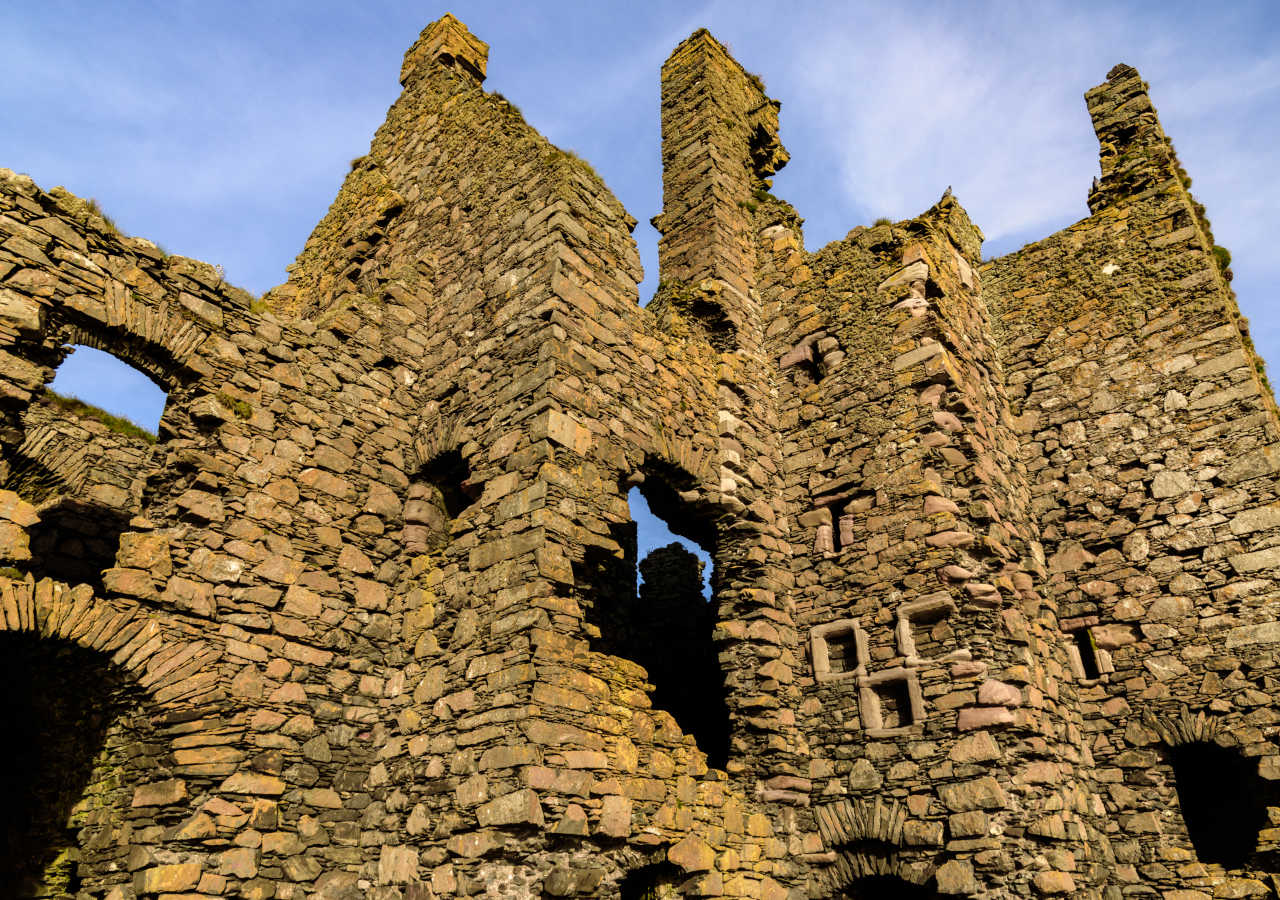 Looking up at the walls of Dunskey Castle in Dumfries and Galloway