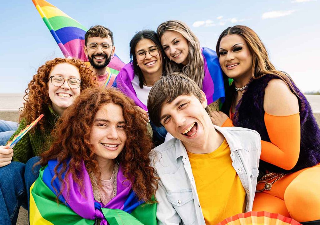 A group of friends celebrating Pride together. 