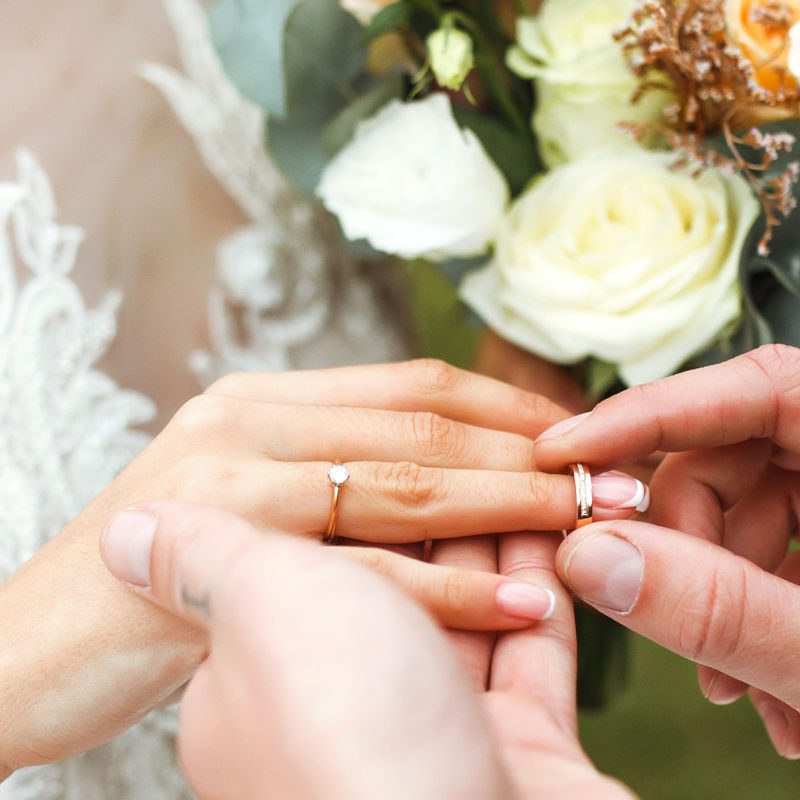 Exchanging rings at a wedding ceremony